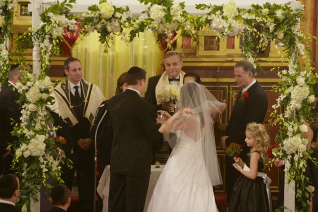 In some wedding ceremonies the bride and groom will be wrapped in a tallit