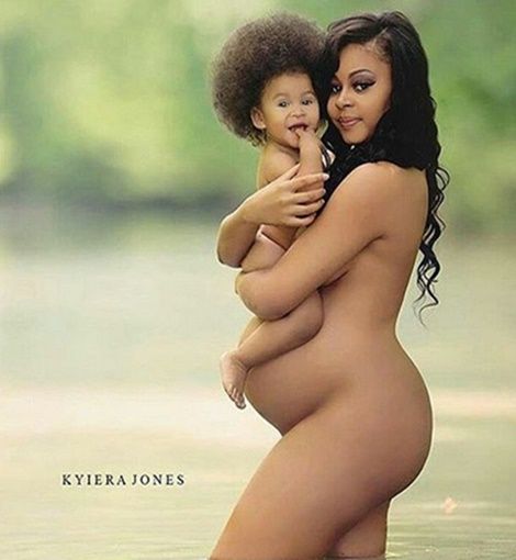 Trending: Totally Naked Lady Carrying Her Naked Son (PHOTO)