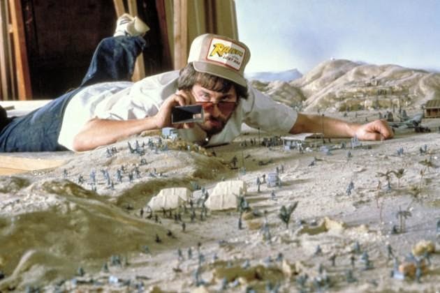 24 Rare Historical Photos That Will Leave You Speechless - Steven Spielberg taking photos of some of the set pieces that were made as miniatures for the first Indiana Jones movie Raiders of the Lost Ark.