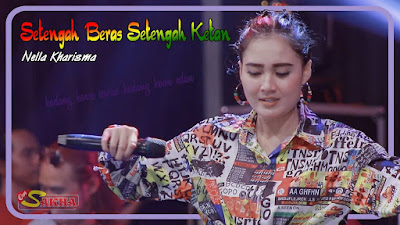 Download Lagu Mp3 Nella Kharisma - Setengah Beras Setengah Ketan