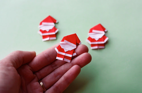http://howaboutorange.blogspot.com/2013/12/make-tiny-origami-santa.html