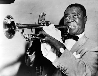 Louis Armstrong playing trumpet