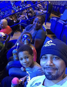 Army National Guard veteran Jason Bowden and his family gather during Marvel Universe Live