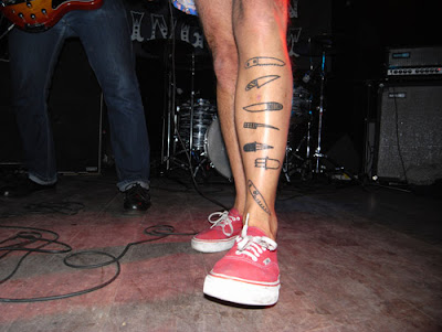 Boris and his excellent knife tattoos during an Adolf Butler performance