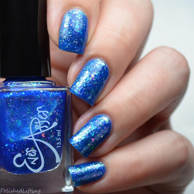 blue jelly nail polish with shifting flakies