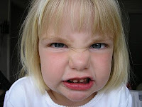 girl making angry face