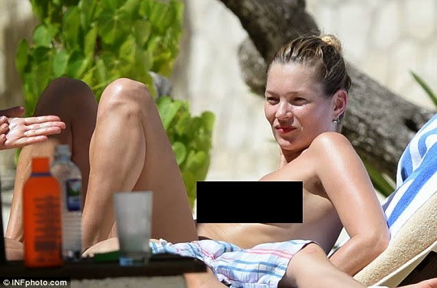 Kate Moss takes it easy while sunbathing topless on holiday in Jamaica 