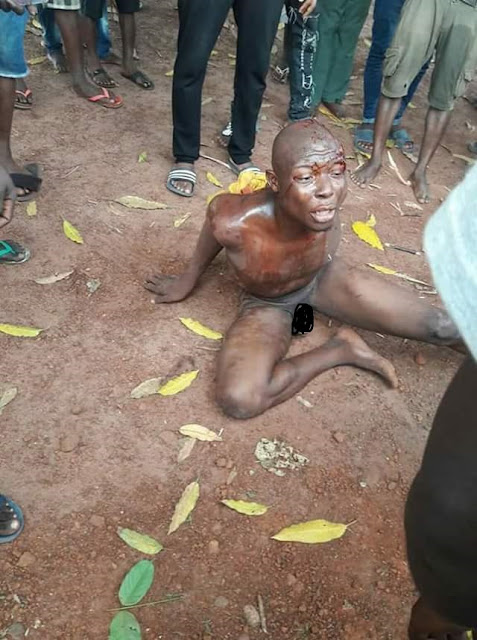 Photos: Man stripped, beaten and nearly killed for stealing Keke in Umuahia