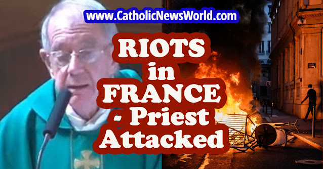 FranceRiots-priest-attacked