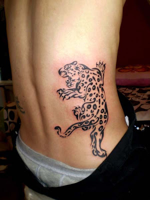 This free cougar tattoo design has a comic style. Posted by beqi at 10:43 AM