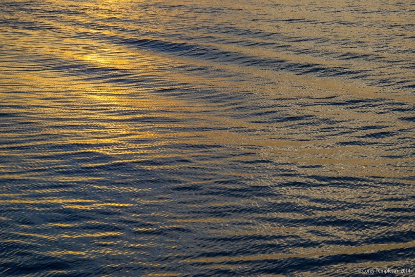 August 2014 Summer Sunset reflected off water of Casco Bay in Portland, Maine USA photo by Corey Templeton