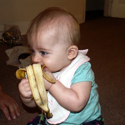 Elaine 6 months eating banana