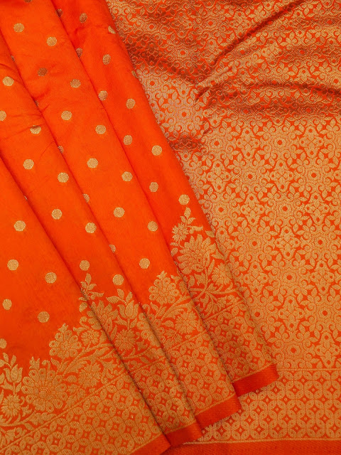 Banarasi Art Silk Saree With All-Over Zari Bundi Motif Banarasi Art Silk Saree With All-Over Zari Bundi Motif