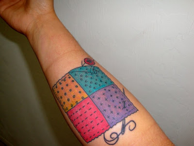 Wanna see more sewing quilting related tattoos Check out this Flickr group