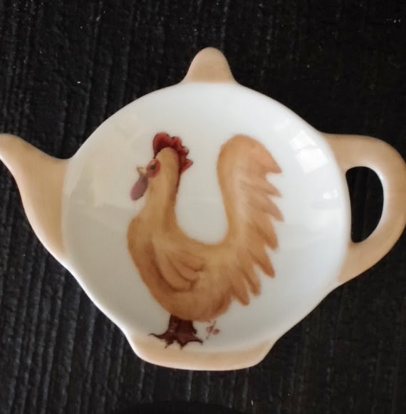 https://www.etsy.com/listing/220572921/hand-painted-porcelain-rooster-tea-caddy?ref=shop_home_active_1&ga_search_query=tea%2Bcaddy