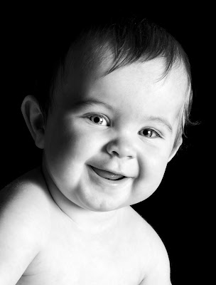 grinning black and white baby portraits, photography 