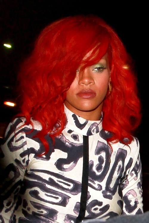 rihanna red hair now. rihanna long red hair 2010