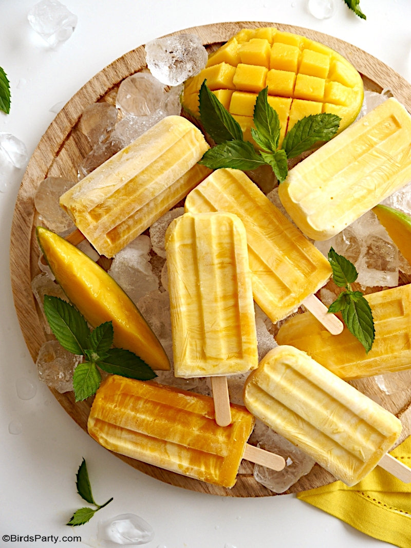 Mango and Yogurt Popsicles - easy to make, healthy, two-ingredient frozen lollipop recipe, perfect as a low-cost summer dessert or yummy snack treat! by BirdsParty.com @BirdsParty #popsciles #fruit #mango #mangorecipes #recipe #frozenpop #frozen #fruitpopsicles