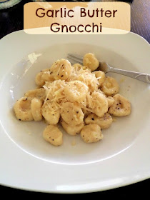 Garlic Butter Gnocchi:  Soft fluffy pillows of warm potato gnocchi tossed in a garlic butter sauce and topped with Parmesan cheese.