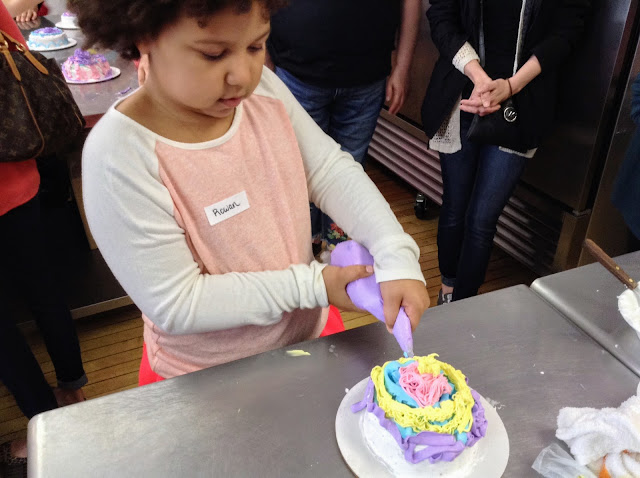 Cake decorating at Wild Flour Bakery for Mother's Day