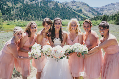 Bridesmaids in light pink with white bouquets l Gatekeeper's Museum Tahoe l Sun + Life Photo l Johnny B Video l Take the Cake Event Planning