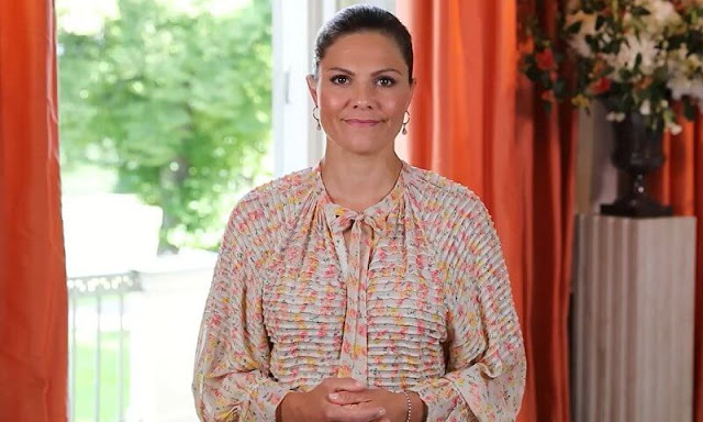 Crown Princess Victoria wore a daydream floral midi dress from Bytimo. Dulong Fine Jewelry bell pendants esme earrings