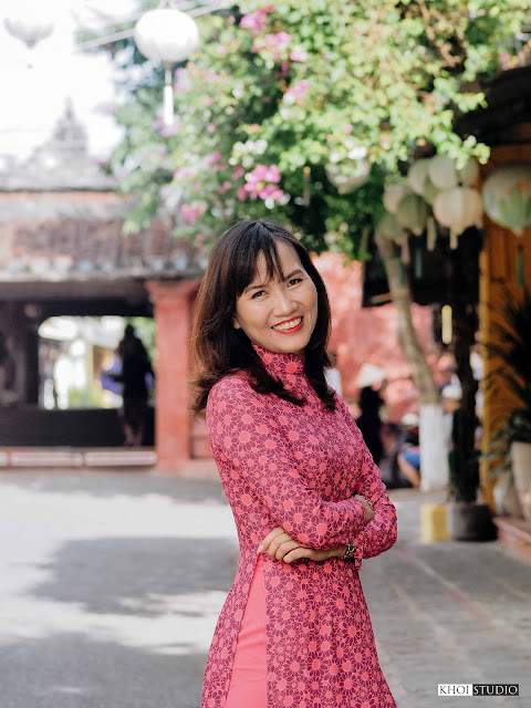 Ao Dai photography tour in Vietnam's yellow city: Take portrait photos with Japanese bridge, ancient houses, Hoai river in Hoi An