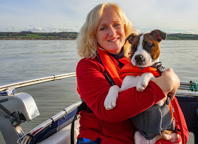Photo of me giving Ruby a cuddle on the aft deck