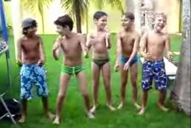 LITTLE BOYS GROUP IN MOOD OF FUN DANCE