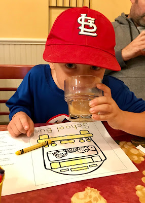 Adorable kiddo drinking coffee