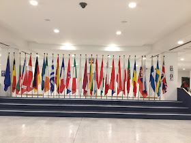 Pic taken inside main foyer of European Parliament of line of Member States' flags