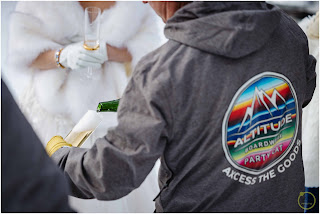 breck party cat pouring champagne for guest