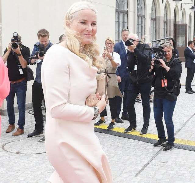 Crown Princess Mette-Marit wore a virgin wool and silk blend midi dress by Valentino. King Harald, Crown Prince Haakon