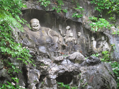 The Laughing Buddha, one of the dozens of reliefs on Feilai Feng