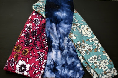 a variety of headbands in different colors and patterns