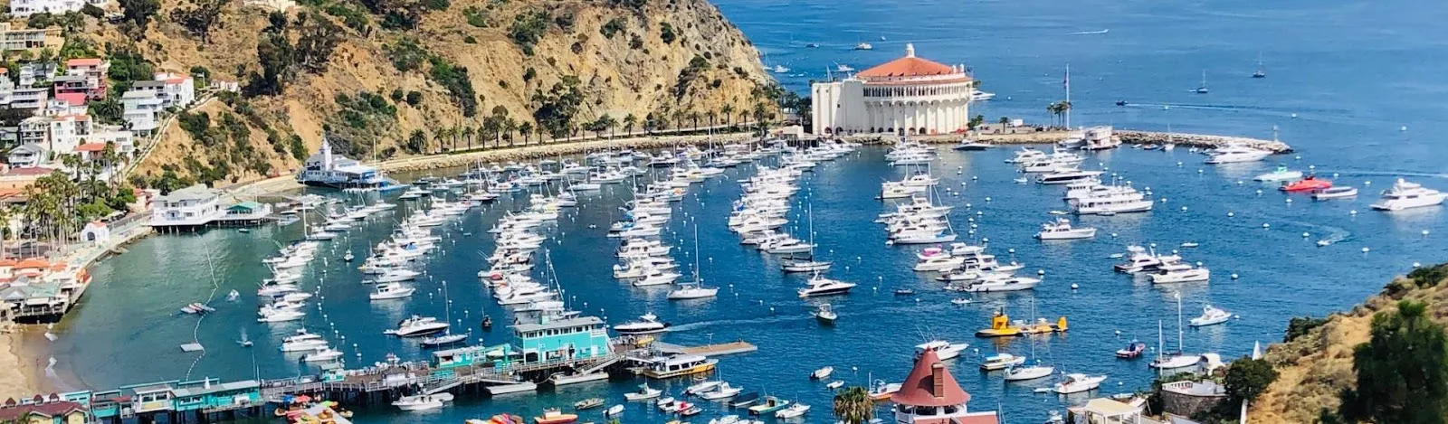 A Peaceful Retreat on Catalina Island, California Are life's stresses and strains overwhelming you? Look no further than Catalina Island for a tranquil getaway that will leave you feeling relaxed and rejuvenated. Despite being only 22 miles away from the mainland, this island feels like a world apart with its unique lifestyle and small population. With limited access points and minimal vehicle noise, Catalina Island offers a serene environment where cars are scarce and visitors can easily explore on foot or by bicycle.    Escape to Serenity Experience a true escape from the chaos of everyday life on Catalina Island. With its secluded location and peaceful atmosphere, this destination is perfect for those seeking tranquility.    Discover Hidden Gems Start your journey at the local Chamber of Commerce & Visitors Bureau, where you can gather all the information you need for an unforgettable stay. From events and attractions to dining and accommodations, they have you covered. It is advisable to reserve your room in advance, especially during peak months when availability is limited.    Unveil the Island's History Immerse yourself in the rich history of Catalina Island by visiting the Catalina Island Museum. From its Hollywood era to the Native American heritage, this museum offers a fascinating journey through time.    Explore Nature's Beauty Just a short distance from Avalon, discover the breathtaking Wrigley Botanical Gardens. Formerly owned by William Wrigley, the gardens showcase a diverse array of flora and fauna, making it a must-visit for nature enthusiasts. For a unique experience, consider staying at Wrigley's converted mansion, now a charming bed and breakfast.    A Beach Oasis While Catalina Island may not boast the same attractions as Los Angeles or San Francisco, it offers a different kind of allure. For those seeking respite from the hustle and bustle of city life, this idyllic beach destination provides the perfect sanctuary.    Embark on a journey to Catalina Island and let its peaceful ambiance wash away your worries. Whether you're looking to unwind on the beach, explore the island's history, or reconnect with nature, this hidden gem promises a serene retreat like no other.