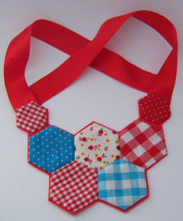 Hexagon patchwork necklace by nearlybutnotquite