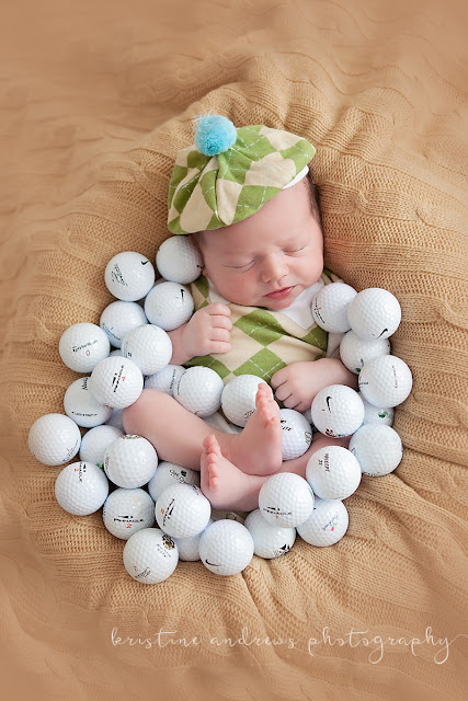 baby with golf balls