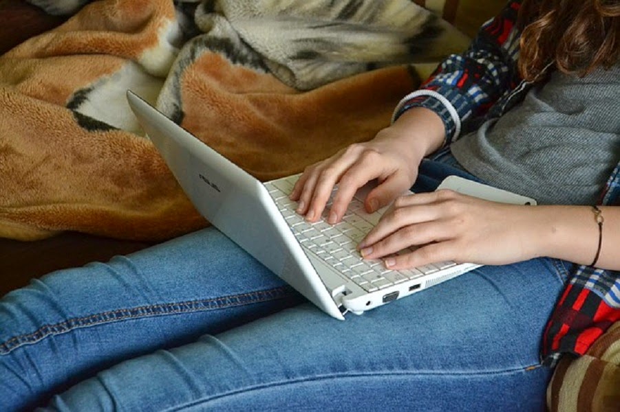 Girl chatting on her laptop