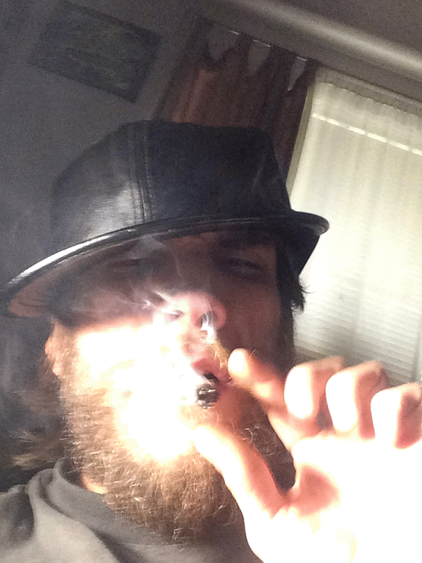 Oregonleatherboy with nice beard blowing thick tasty ganja smoke wearing leather hat hypnosmoke sexy capnolagnia style