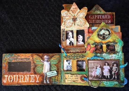 Altered mixed media children's book using primarily DecoArt products. 