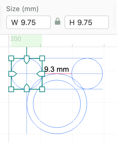 Position the ears on either side of the outer ring