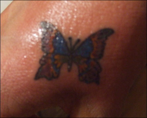 Cute Bikini Line Tattoos. Cute colorful butterfly design