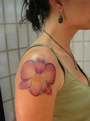 Beautiful orchid flower tattoo engraved on the feet using nice colors. Phoenix Bird With Orchid Flower Tattoo. The meanings of orchids are very