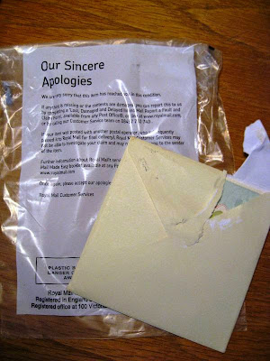 Torn envelope and letter headed 'Our Sincere Apologies'