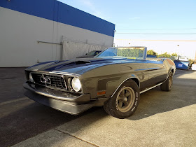 1973 Mustang with new front end, fender, door & quarter panel.