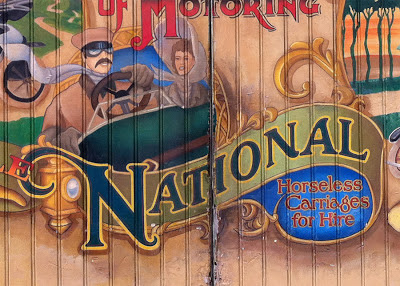 Disneyland Main Street mural National sponsor vehicles