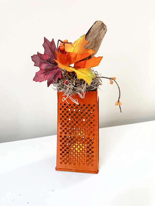 cheese grater lantern with leaves and stem