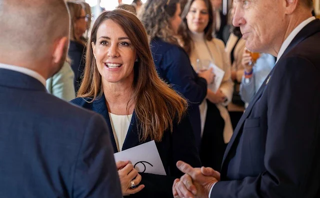 Princess Marie wore a navy single-breasted jacket in three dimensional jacquard fabric by Emporio Armani