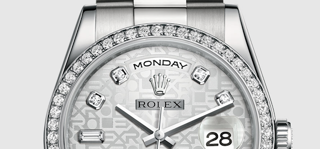 close up photo of platinum diamond rolex day-date